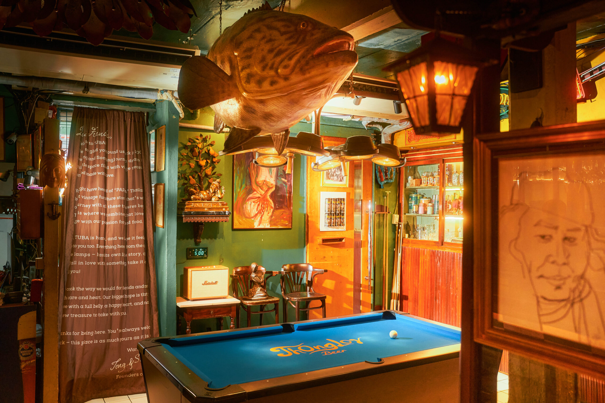 TUBA restaurant dining room furnished with vintage pieces