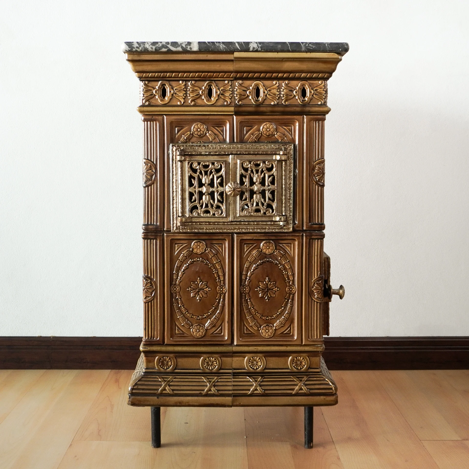 Old Chascoal stove with stone top tiles, French, 20th century. The stove has a separate hearth and an oven