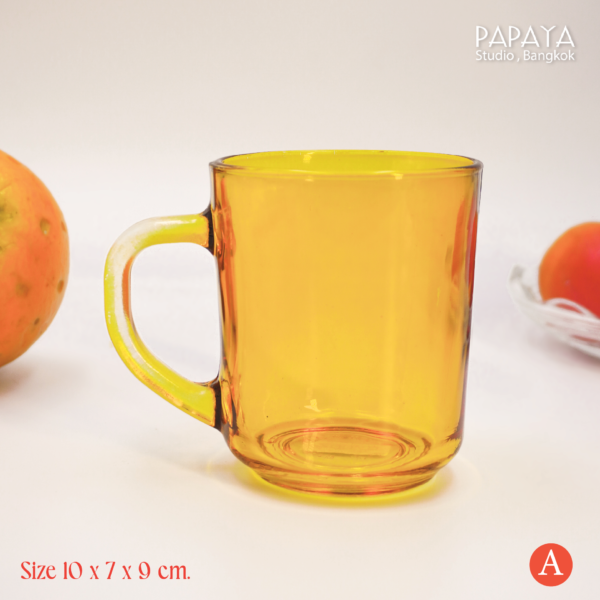 Vintage amber glass mugs.